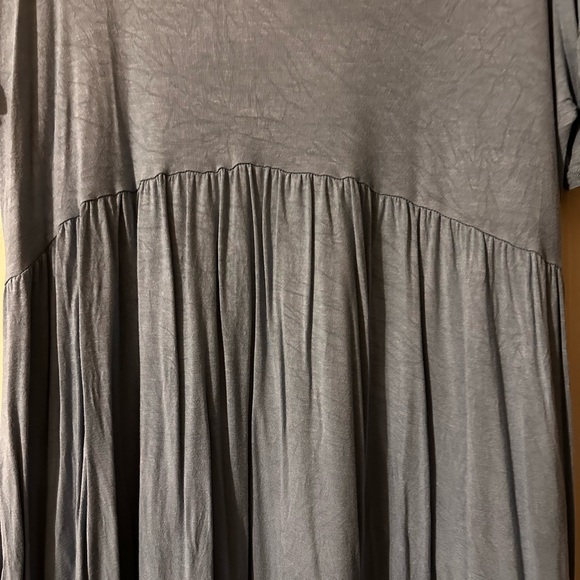 Denim blue baby doll style top. Fairly long and is short ruffle sleeves. - Picture 2 of 4